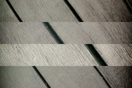 Abstract Background texture of wooden decking with parallel planks with gaps.の写真素材