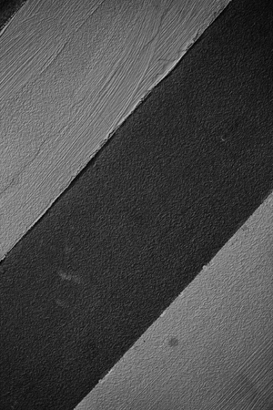 Monochrome Wall with lines, detail of decoration in the city, textured background.の写真素材