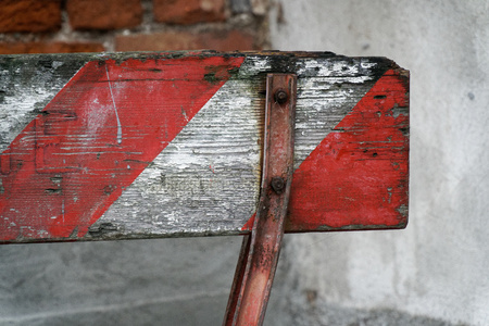 Red and White Lines of wooden barrier . At subway station of airport background Red White warning fencing is protects for No entry.の写真素材