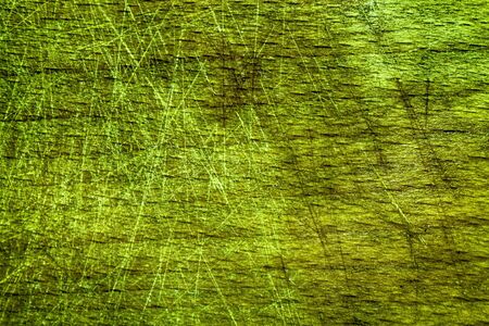 Golden Lime painted close-up vintage empty cutting board, food background concept, wooden textured surface.の写真素材