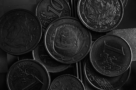 Monochrome Pile of Euro coins lies in mirror reflect wallet liesの写真素材