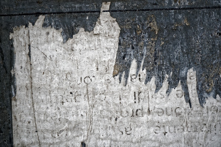 Torn poster after vote on tin textured wall Ripped newspaperの写真素材