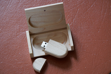 Usb flash drive with wooden surface in wooden box on desk for USB port plug-in computer laptop for...