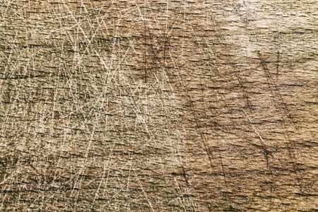 Close-up vintage empty cutting board on bamboo planks, food background concept.の写真素材