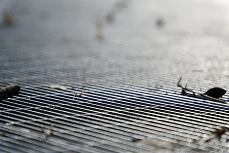 Steel ground lattice. Stainless steel texture, background for web site or mobile devices.の写真素材