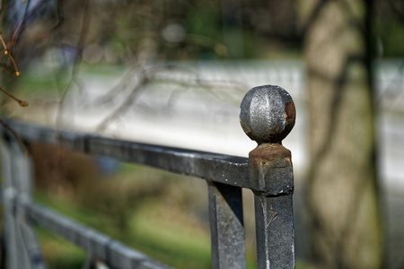 Fence in public park, safety access in entrance.の写真素材
