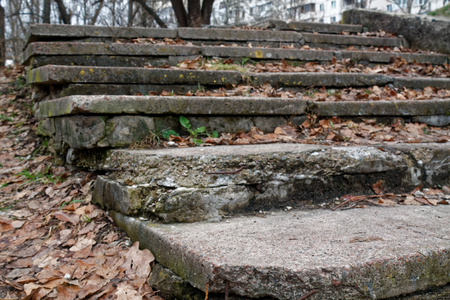 Brick grunge Stone stairs with autumn leafs, background for web site or mobile devicesの写真素材