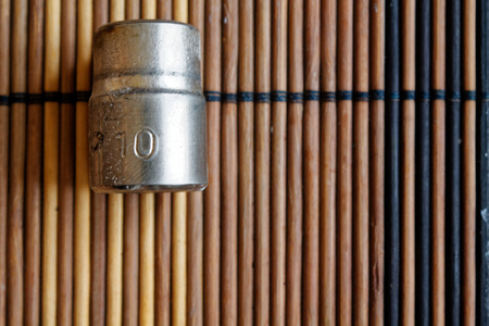 Torx Socket for spanner on wooden background, wrench sockets size is 10