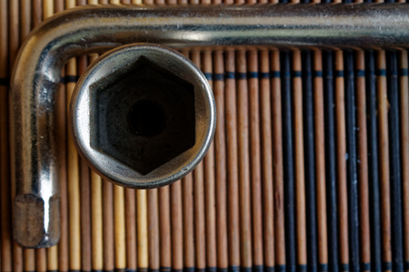Spanner fastenerson with wooden background, wrench partの写真素材