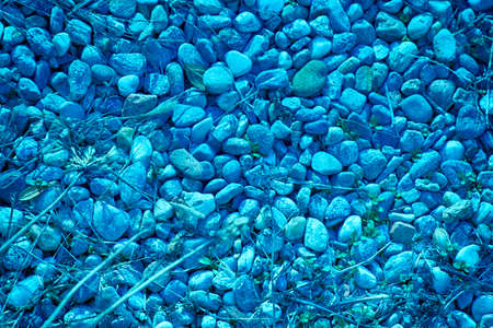 Stone texture, rock surface level, pebble background for web site or mobile devices.の写真素材