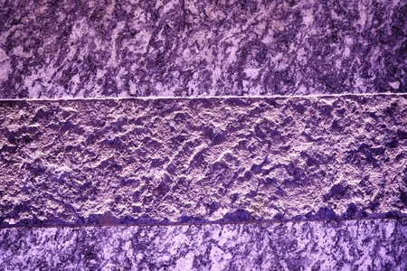 Decorative golden plaster texture on the wall - art brush stroke background.
