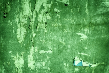 Ultra green Torn poster after vote on tin textured wall Ripped newspaperの写真素材