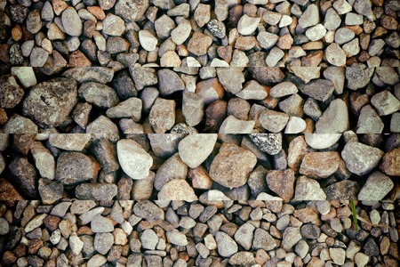Stone texture, rock surface level, pebble background for web site or mobile devices.の写真素材
