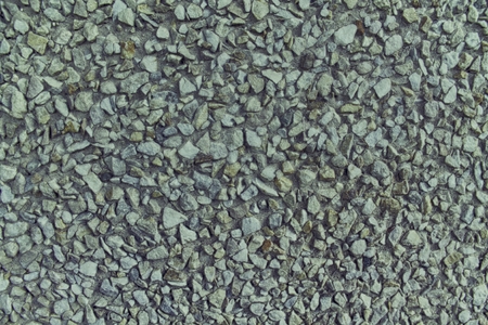 Pebble textured surface, stone backdrop and boulder background.