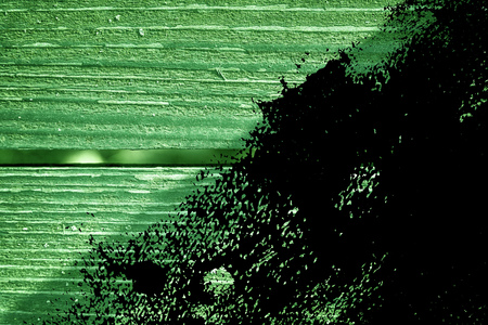 Grunge Golden lime colored Texture of old, shabby, green paint on an old wooden bench.の写真素材