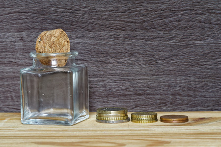 Idea in business casual stacking money as concept for success or savings, investment and accounting.
