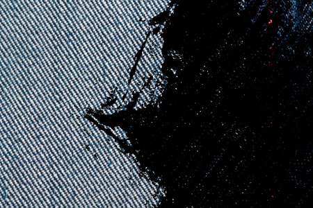 Grunge dirty Denim texture with red seam for jeans background.の写真素材