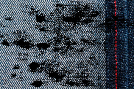 Grunge dirty Denim texture with red seam for jeans background.の写真素材