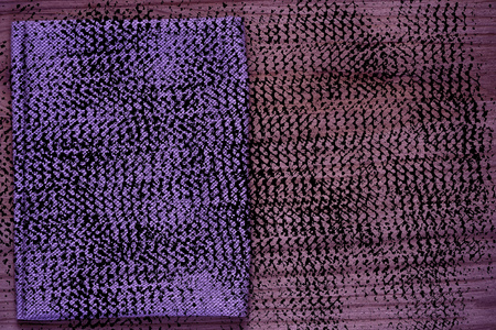 Ultra purple Postcard sample, linen fabric surface on wooden table with free copyspace for greeting...