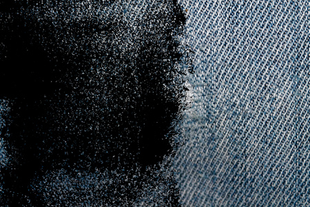 Dirty grunge Jeans blue macro texture for denim background.