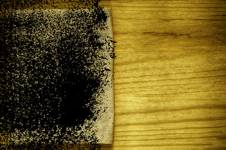 Ultra yellow Postcard sample, linen fabric surface on wooden table with free copyspace for greeting text, for mock-up or designer use, book cover sample.の写真素材