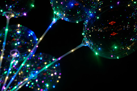 Glowing ball rays in the dark.