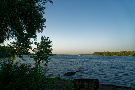 Sunset along the banks of riverの写真素材