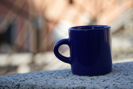 Cup of tea or coffee on defocused background.の写真素材