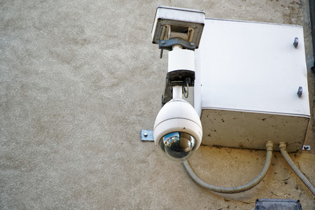 Security camera and video equipment box on old wallの写真素材