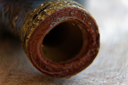 Pipe thread close-up, old rusty metal part of pipe threads.