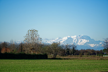 Mountain Sight Landskape and green field, clear blue sky.の写真素材