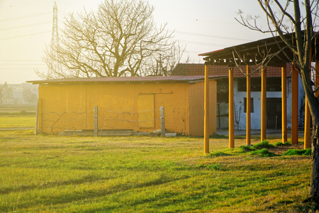 Farm facade from courtyard at sunrise.の写真素材