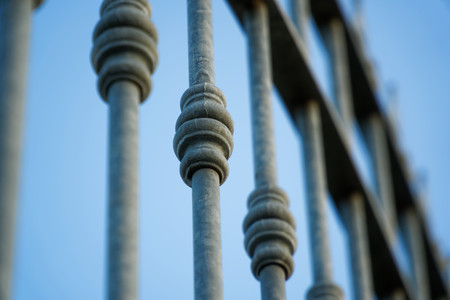 Forged iron fence closed up ornamentの写真素材