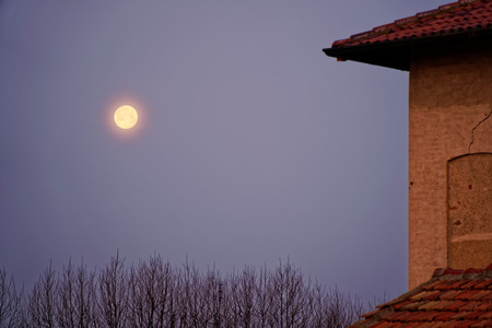 Moon in the morning, full old moonの写真素材