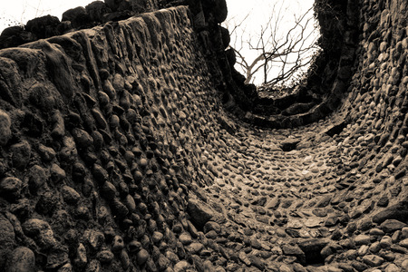 Inside Old ruined stone tower, grunge technique texture, rock rough surfaceの写真素材