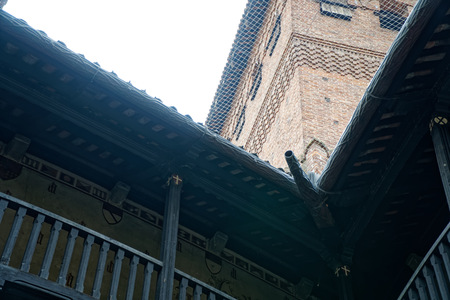 Medieval wooden gallery of the second floor in an old stone castle.の写真素材