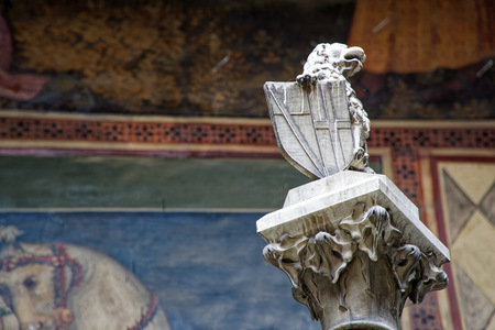 Medieval sculptures on Wall, decorated building with mythical creaturesの写真素材