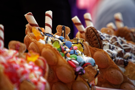 Fresh sweet bakery with candies and ice cream street food.の写真素材