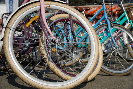 Bicycle wheel in a row close-up wheel detail, bicycle spokeの写真素材