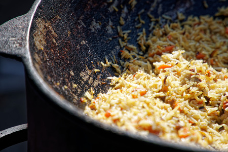 Fried rice with chicken, prepared and served in wok. Natural healthy food.の写真素材