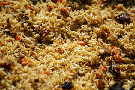 Fried rice with chicken, prepared and served in wok. Natural healthy food.の写真素材
