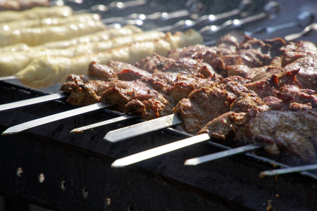 Barbecue meat on grill, traditional street food.の写真素材