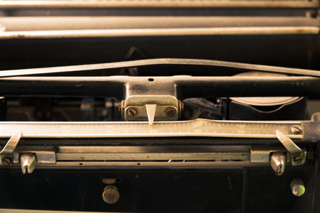 Old typewriter in antique photography vintage simulated, grunge photo.の写真素材