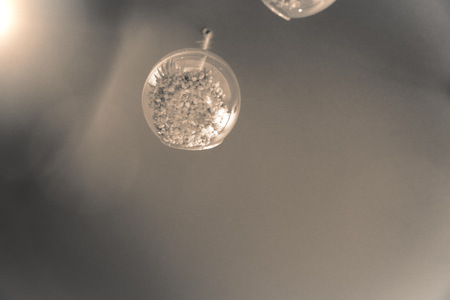 Decorative lighting design, cafe interior, Light Lamp with Bulb Hanging In the Cafe. Decorative Industrial Interior Loft Style in the Restaurant - Panoramic Shotの写真素材