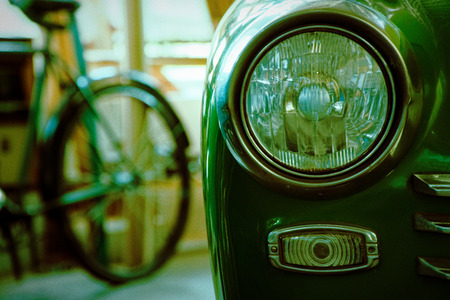 Headlight of antique old car, detail on the headlight of a vintage car. Selective focus.の写真素材