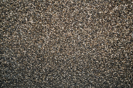 Small brown pebbles create nice pattern, gravel texture.の写真素材
