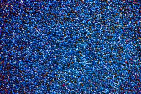 Blue atoll pebbles create nice pattern, gravel texture.の写真素材