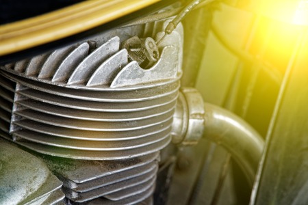Old motorcycle motor engine in vintage photo.の写真素材