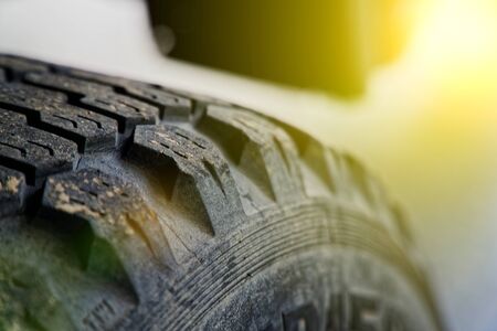 Car tires from old track, selective focus, close-up rough surface.の写真素材