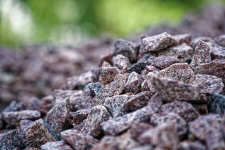 Road gravel and granite gravel texture. Crushed Gravel background. Pile of Stones texture. Industrial coals.の写真素材